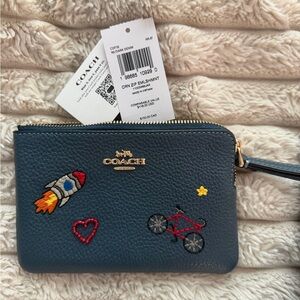 Coach Dark Denim Leather Wristlet with Embroidered Rocket & Bicycle